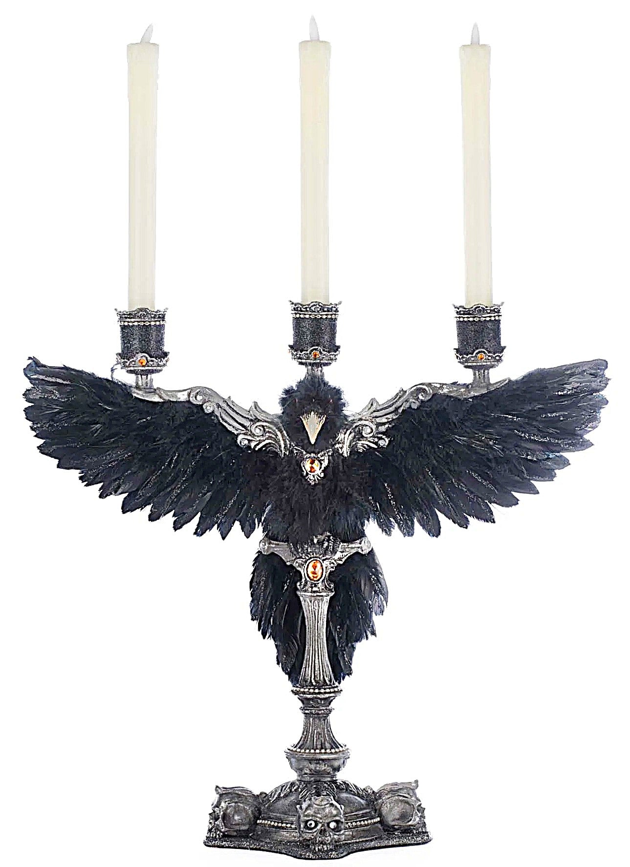 Decorative candle holder with black feathers and silver base on a white background
