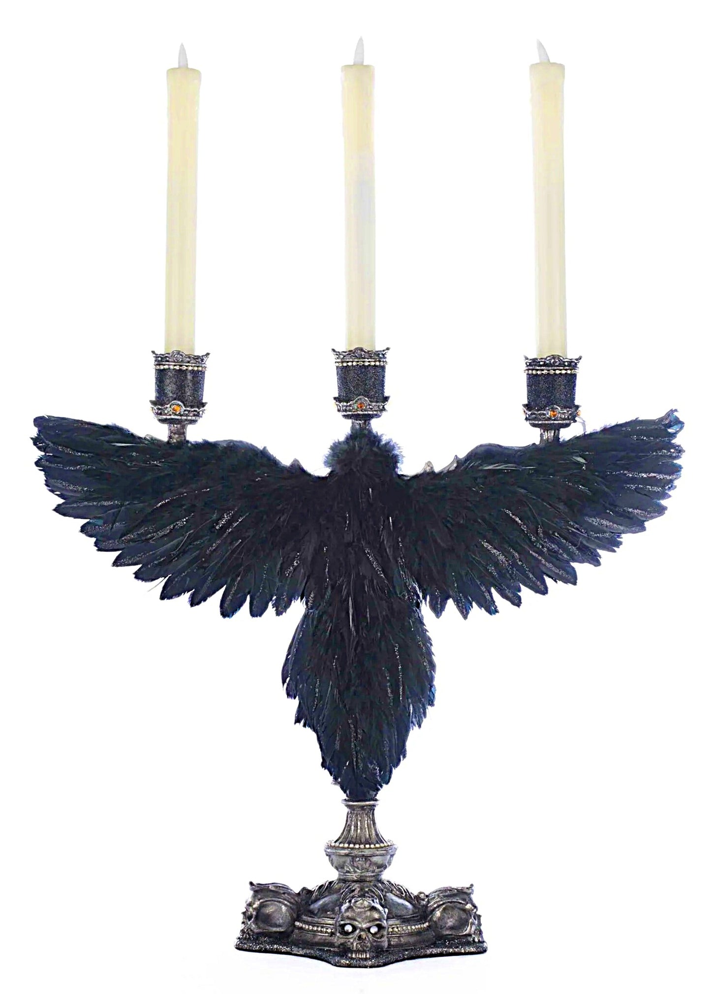 Decorative candle holder with blue feathers and three candles on a white background