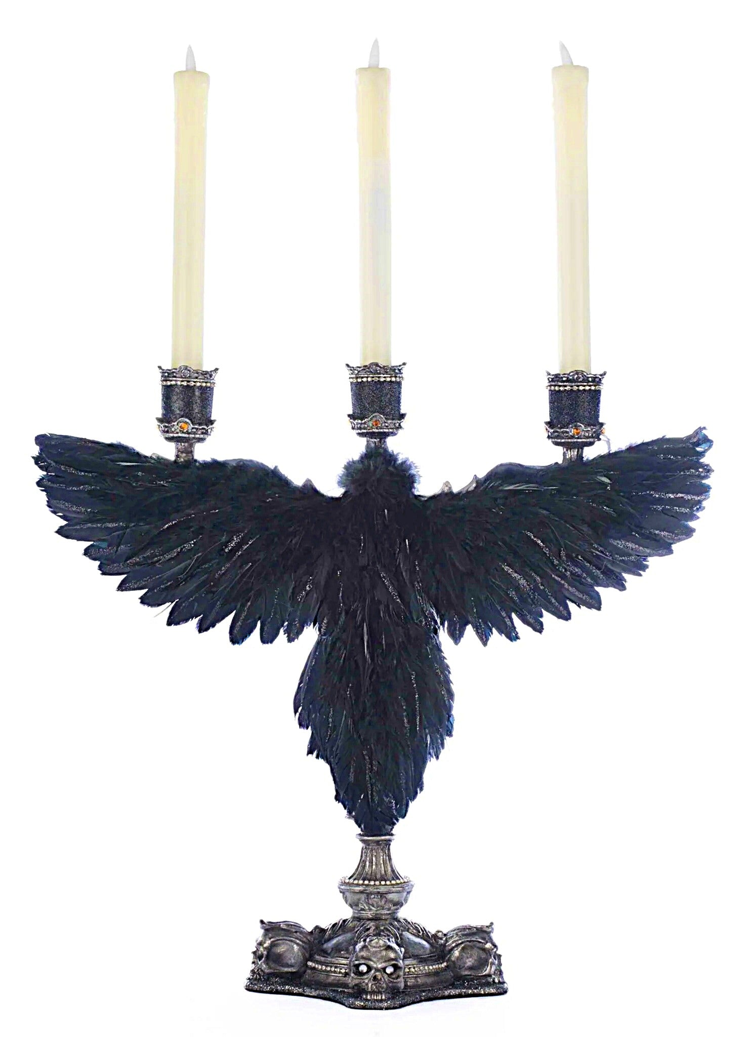 Decorative candle holder with blue feathers and three candles on a white background