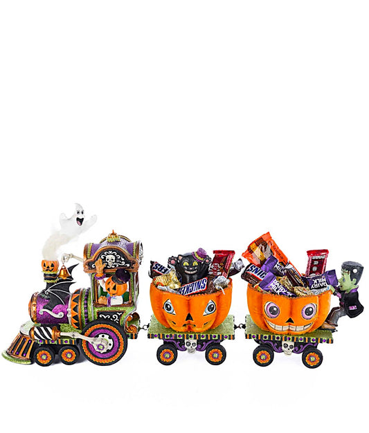 Halloween-themed candy train with pumpkins and ghosts on a white background