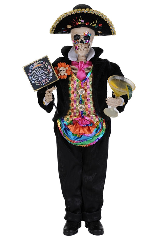 Decorative skeleton figure in a black outfit with colorful accessories on a white background