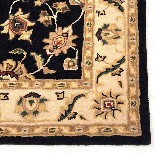 Close-up of an ornate rug with floral patterns on a white background