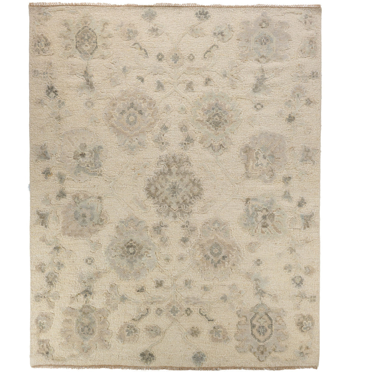 Beige area rug with floral pattern on a white background