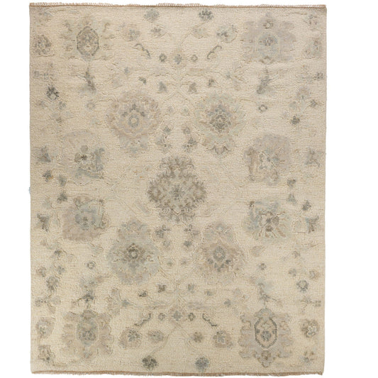 Beige area rug with floral pattern on a white background