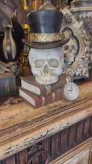 Skull with Top Hat on Stack of Books