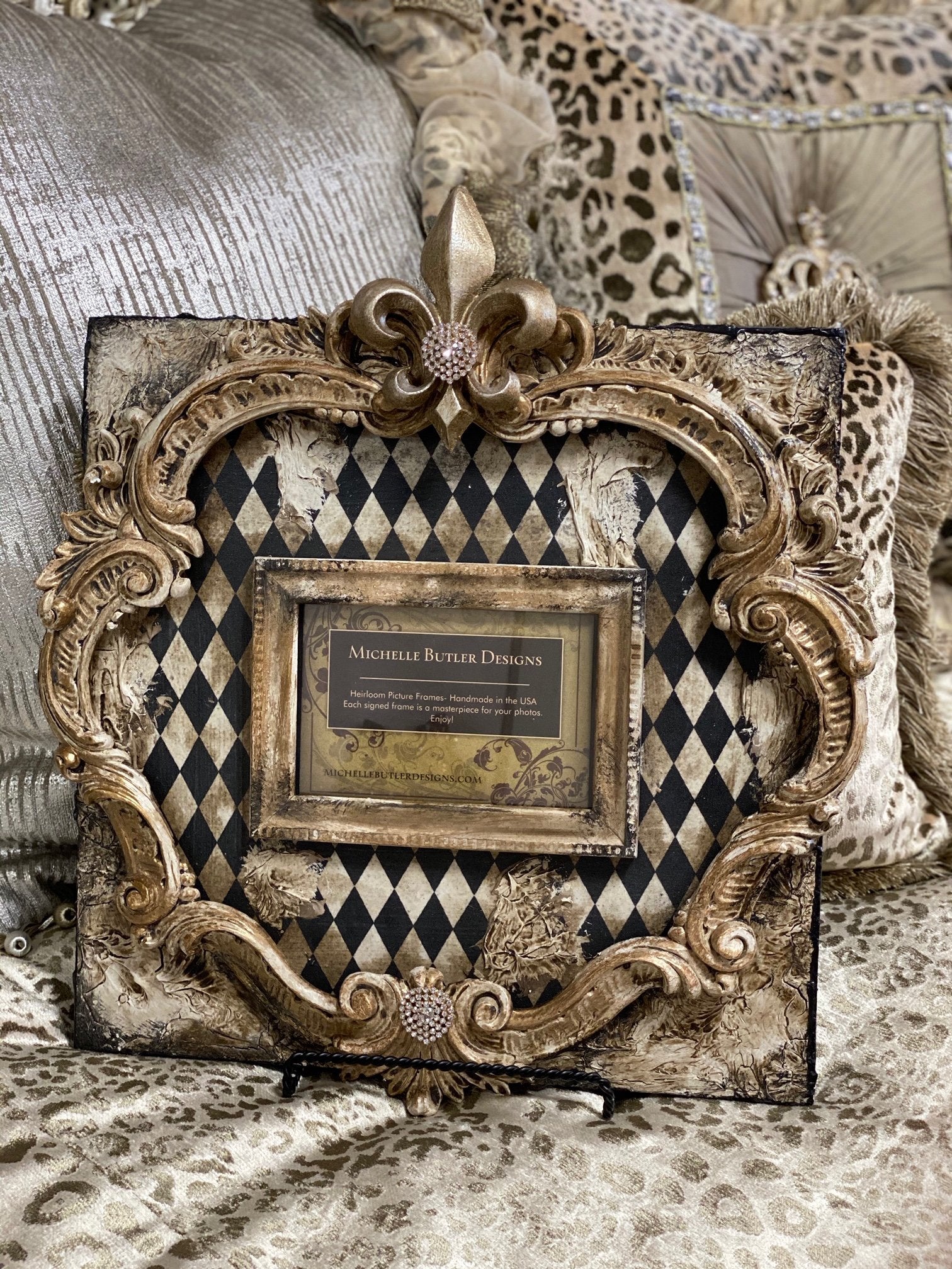 https://reilly-chanceliving.com/cdn/shop/products/Michelle_Butler_table_top_frames_with_harlequin_pattern-old_world_picture_frames-decorative_picture_frames-heirloom_picture_frames-reilly_chance.jpg?v=1599945397
